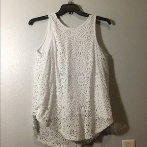 Sleeveless white blouse